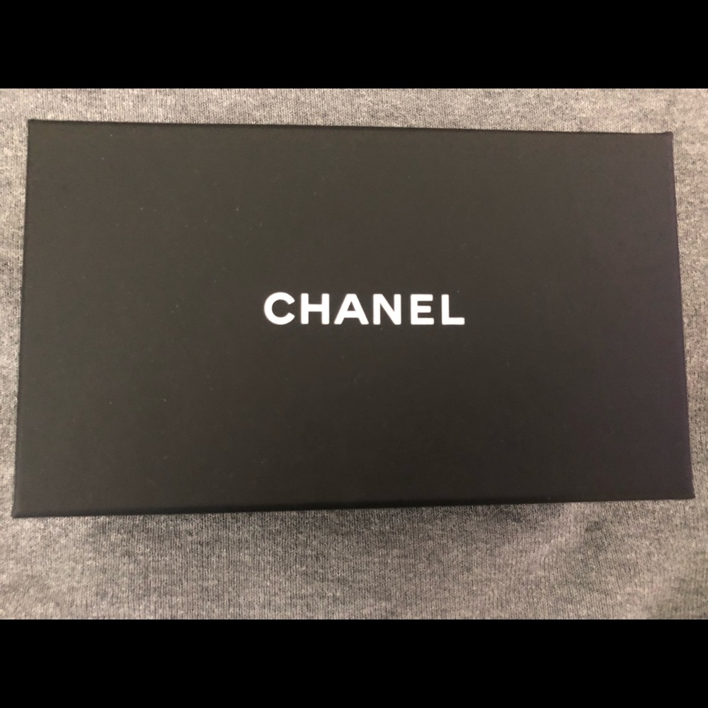Authentic Chanel box with bow.